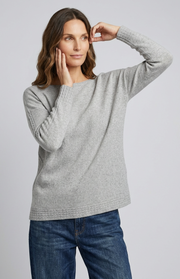 Maglione a barchetta con trecce
