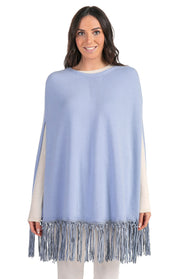 Poncho con frange in pelle