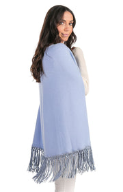 Poncho con frange in pelle