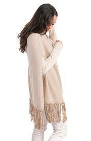 Poncho con frange in pelle