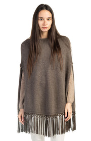 Poncho con frange in pelle