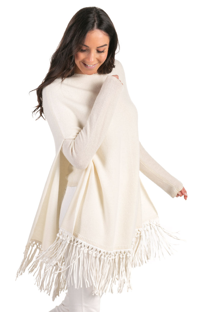 Poncho con frange in pelle