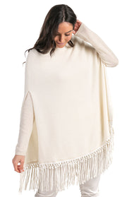 Poncho con frange in pelle
